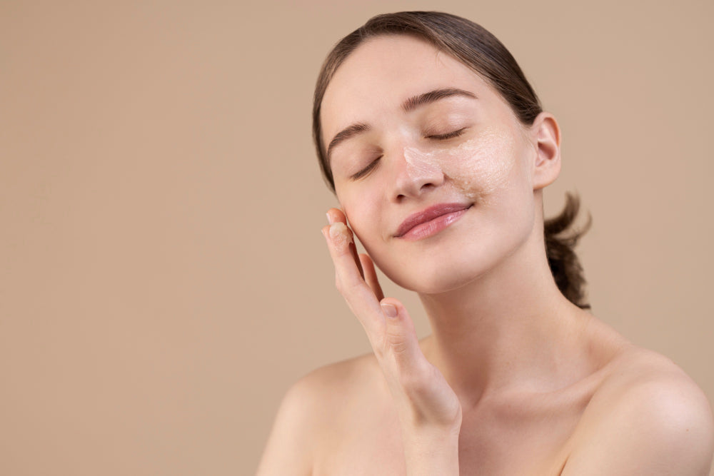 Woman applying pH-balanced skincare products for healthy skin