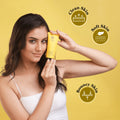 Woman holding Cassia cleanser for clean, soft, bouncy skin — gentle skincare for all skin types