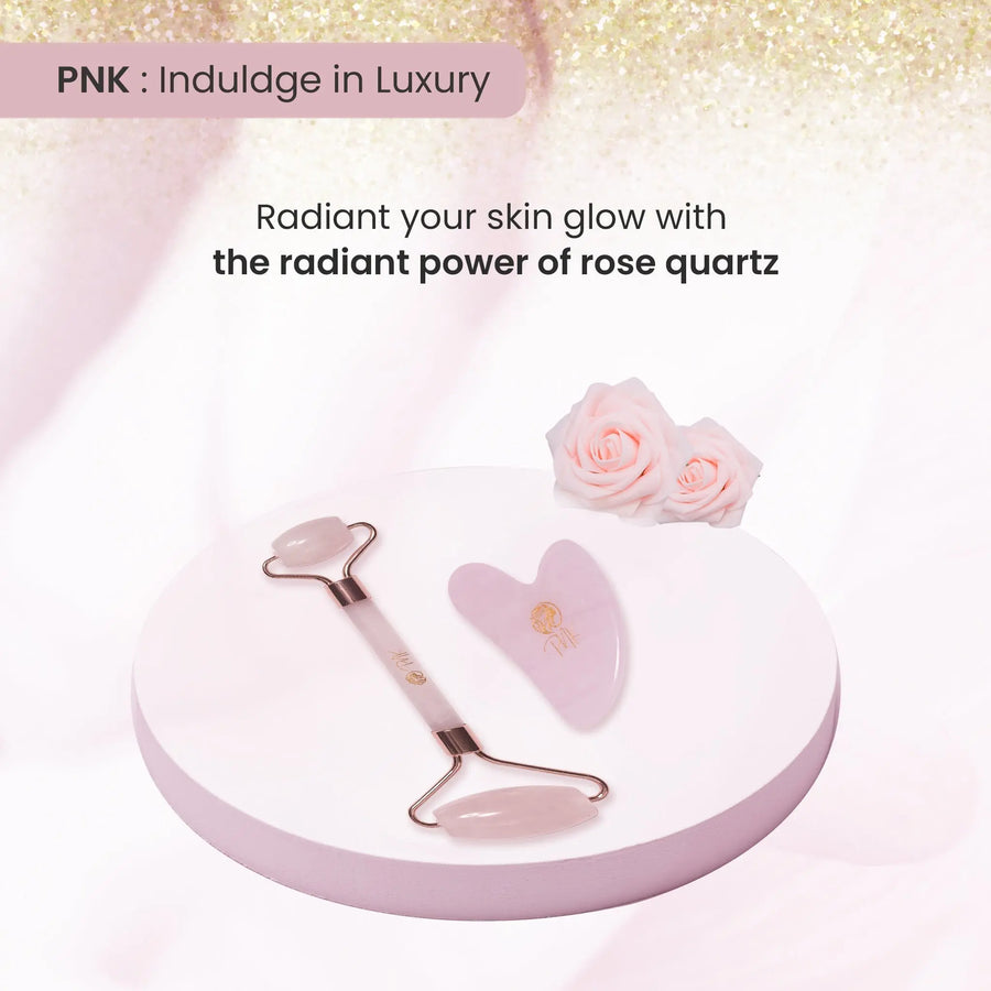 Rose quartz facial roller and heart-shaped gua sha for radiant skin glow, luxury skincare tools with pink roses