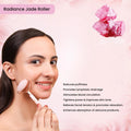 Woman using pink jade roller for facial massage to reduce puffiness and improve skin tone