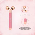 Pink micro-current facial roller with dual rose gold rollers, vibration feature, and battery-free use for skincare routines.