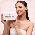 Woman holding PNK Radiant Gold 3D electric face and body massager box for glowing skin care